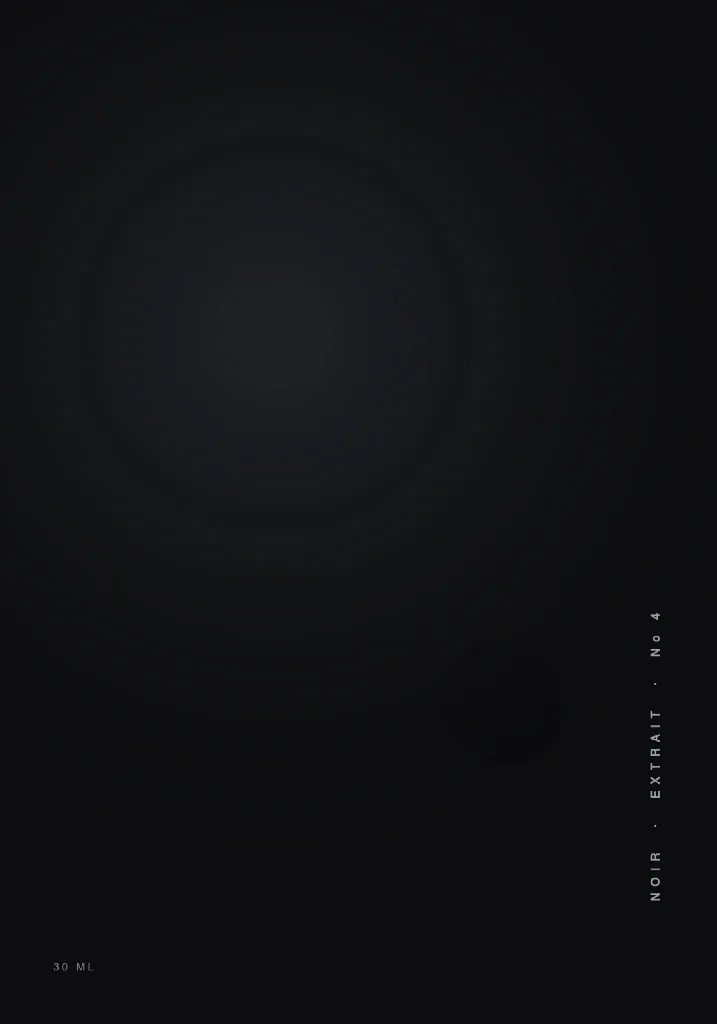 The NOIR label: a dark soft-touch field with two raised discs